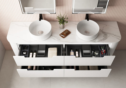 Sleek design of Curva wall-hung vanity with minimalist finger pull drawers in a Melbourne home.
