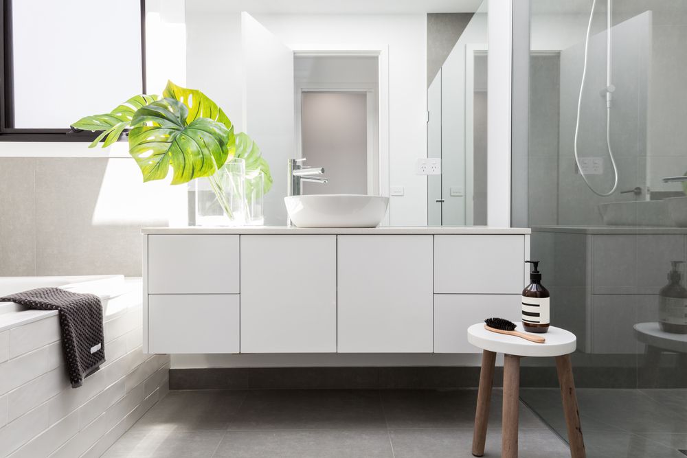 luxury-white-family-bathroom-styled-greenery-wall-hung-hera-bathware