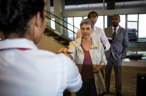 Seniors ask airport staff for help
