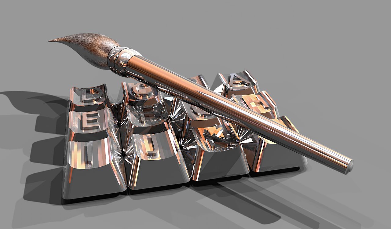 Metallic keyboard with a metal paint brush on top