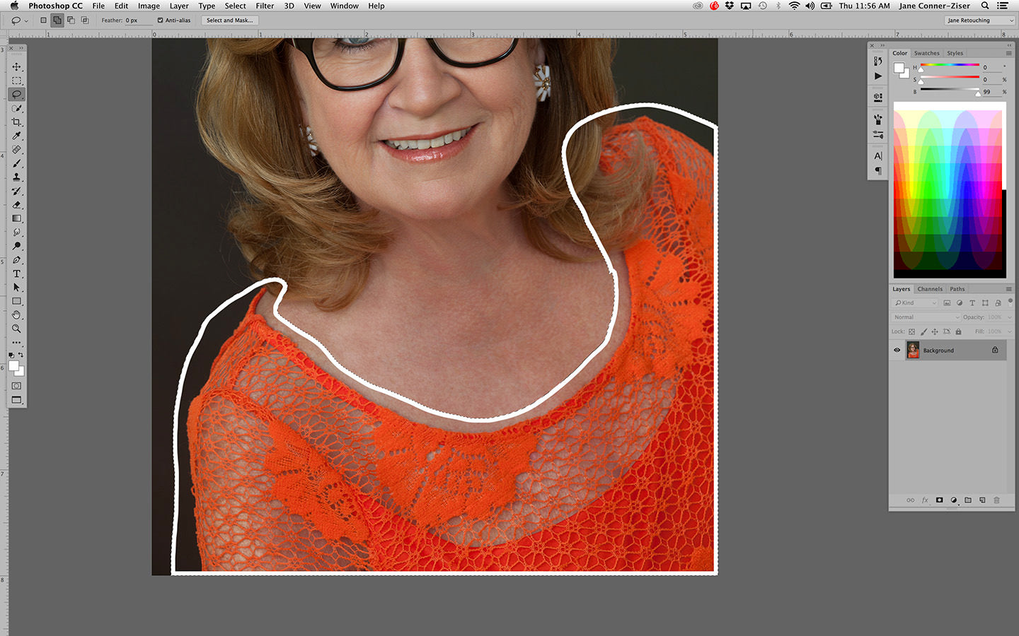 Woman's orange blouse being selected using the Color Range tool