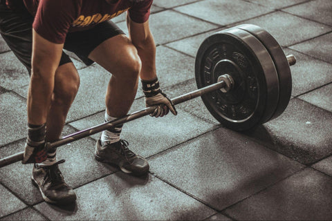 person doing a deadlift exercise