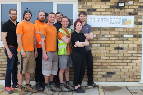 All of our dedicated staff members standing in front of the Primethorpe Paving store, ready to provide exceptional customer service and high-quality paving and landscaping materials