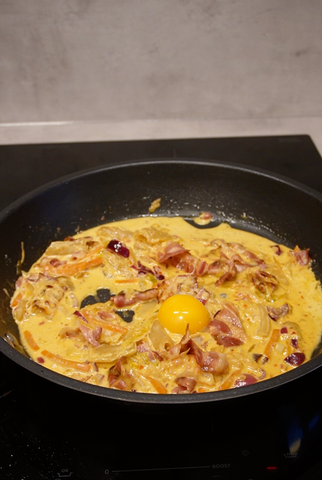 Added egg yolk into pan
