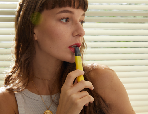 Lady vaping an ELF Bar