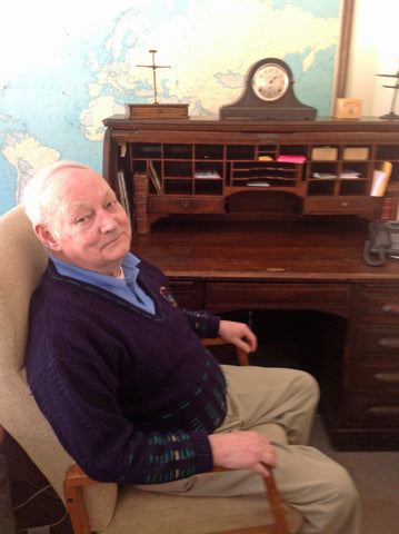 Jim Sr. seated at Lester Vail’s desk