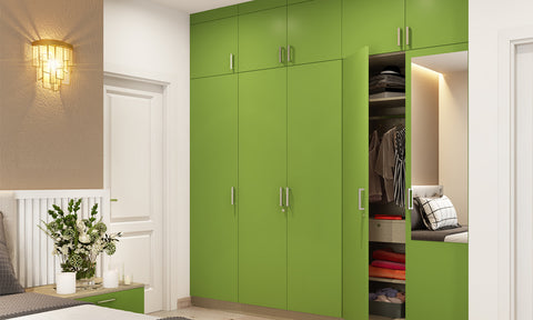 5- door bedroom wardrobe design in a green colour with a seamless storage