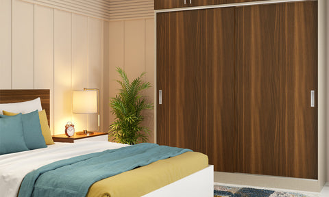 Beautiful bedroom 2 bhk flat interior design that includes a floor-to-ceiling wardrobe