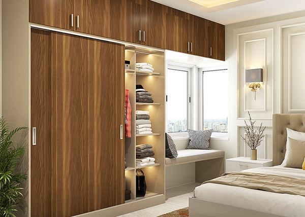 Modern sliding wardrobe design paves the way for cosy window bay seating