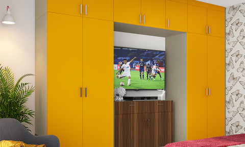 Modern wardrobe design with TV unit and additional storage