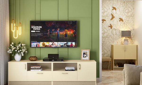Consider personalising your living room TV showcase with decorative elements to suit your style