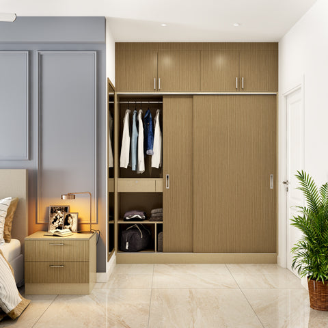 Bedroom with a sliding wardrobe design in natural teak finish laminate exudes a warm and inviting aura