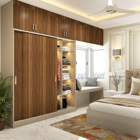 Brown wall almirah design with bay window seating and sliding doors ensures a clear path