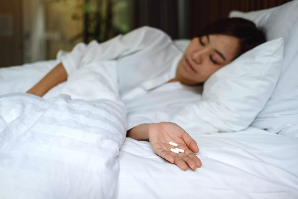 A Woman Enjoying Restful Sleep After Undergoing Bioidentical Hormone Therapy + Pellets