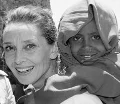 Internationale Vrouwendag Audrey Hepburn met kindje Unicef