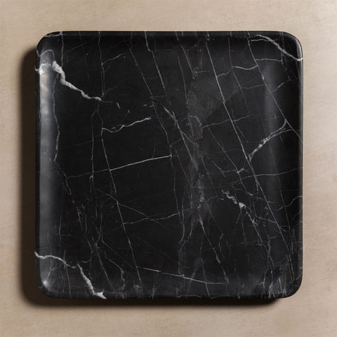 Square stone tray made from black marble.