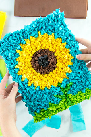 https://cdn.shopify.com/s/files/1/0635/4468/8866/files/Tissue-Paper-Sunflower_480x480.jpg?v=1671450140