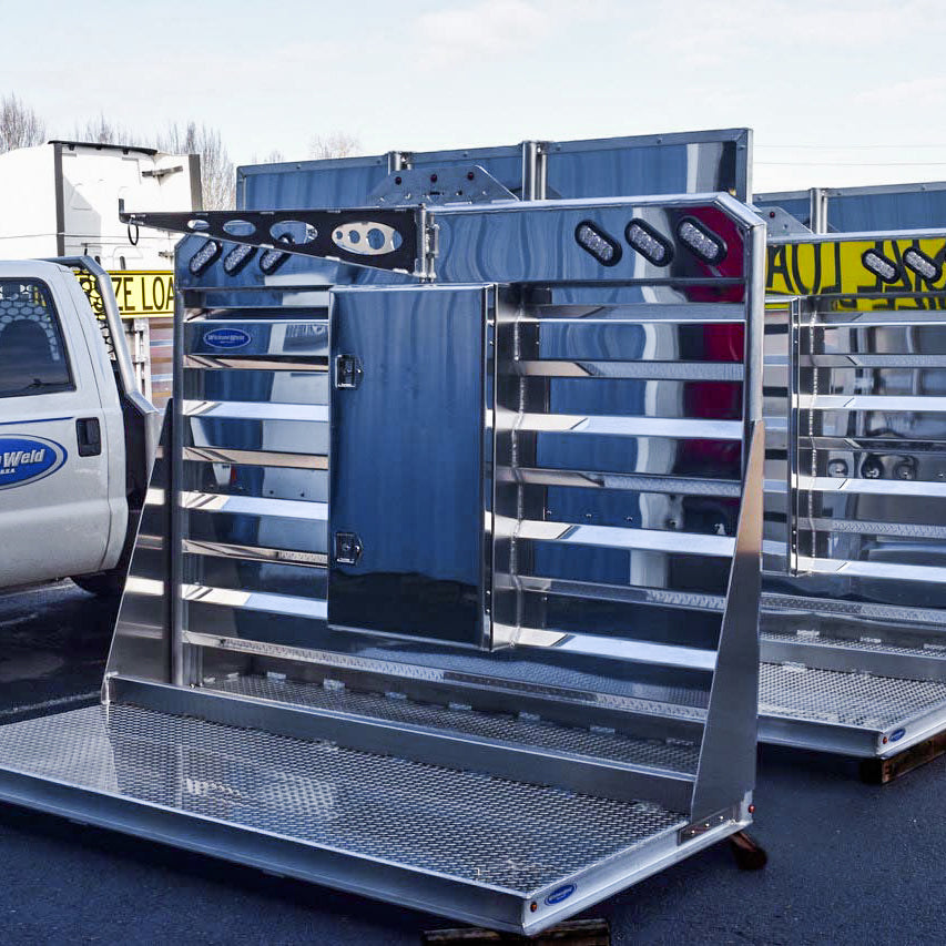 Class 8 Droms lined up outside in a polished aluminum finish