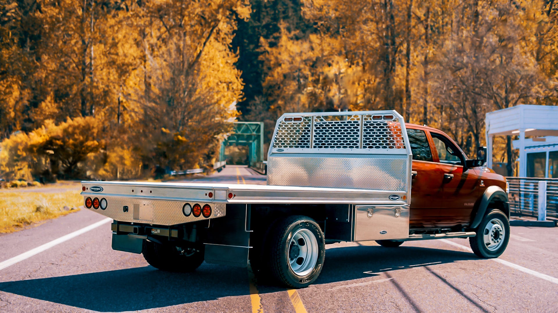 Wickum Flatbed with Autumn trees behind it