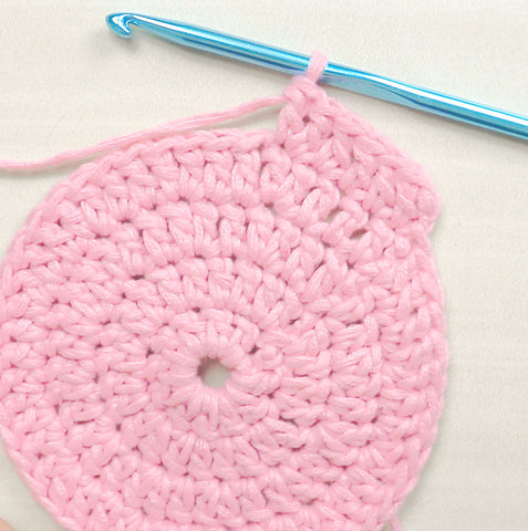 Crochet circle - several rows completed. Flat circle, no curling.