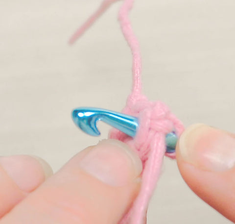 Single crochet placing hook under front and back loops of the stitch