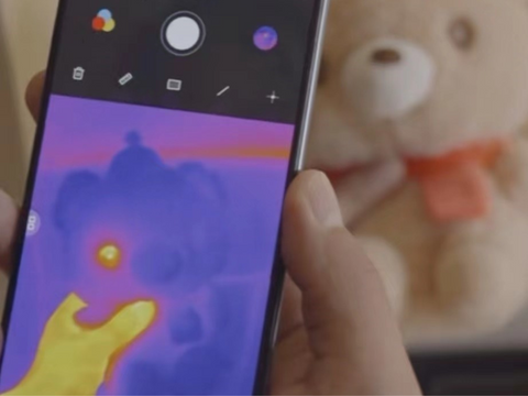 01 A needle-sized camera detected within the eye of a teddy bear using a thermal imaging camera