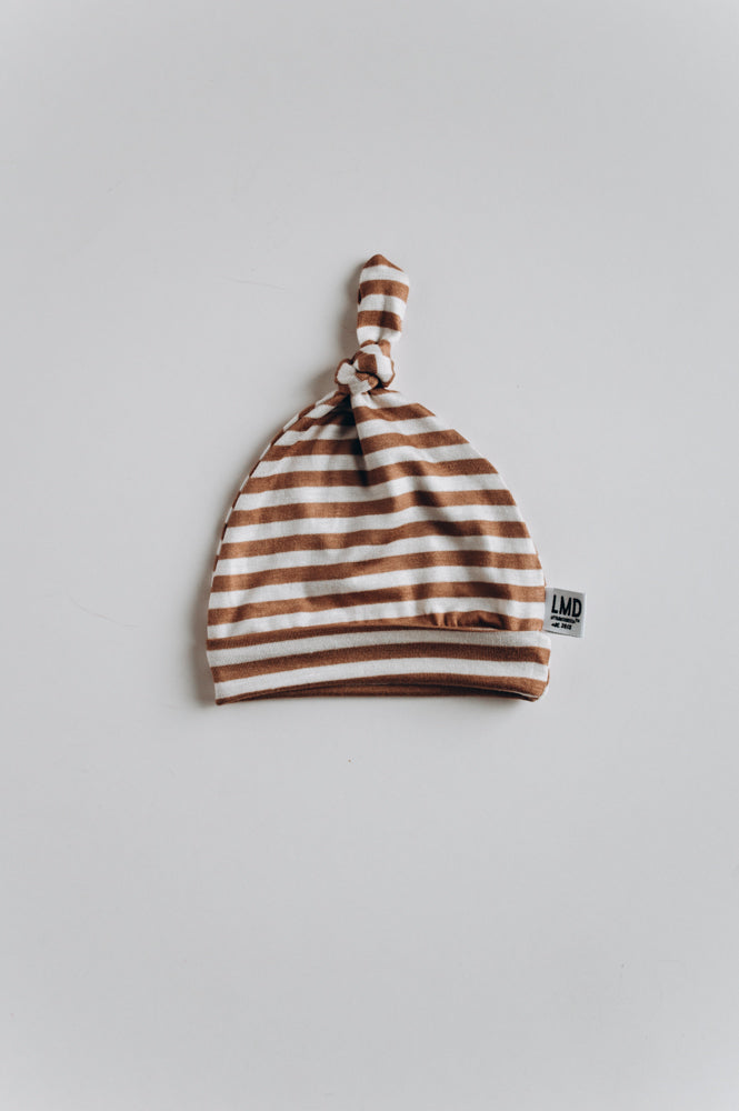 knotted baby hat in camel stripe