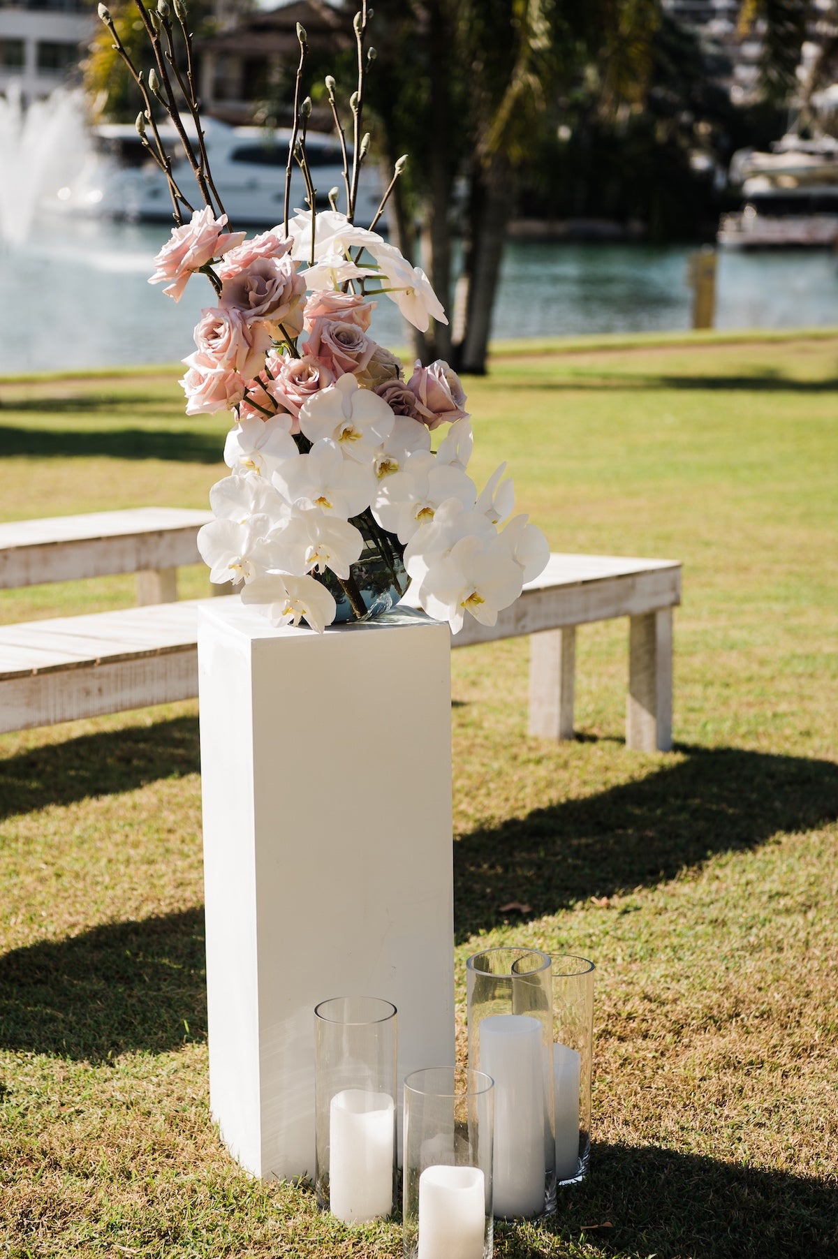 wedding ceremony entrance flowers with candles