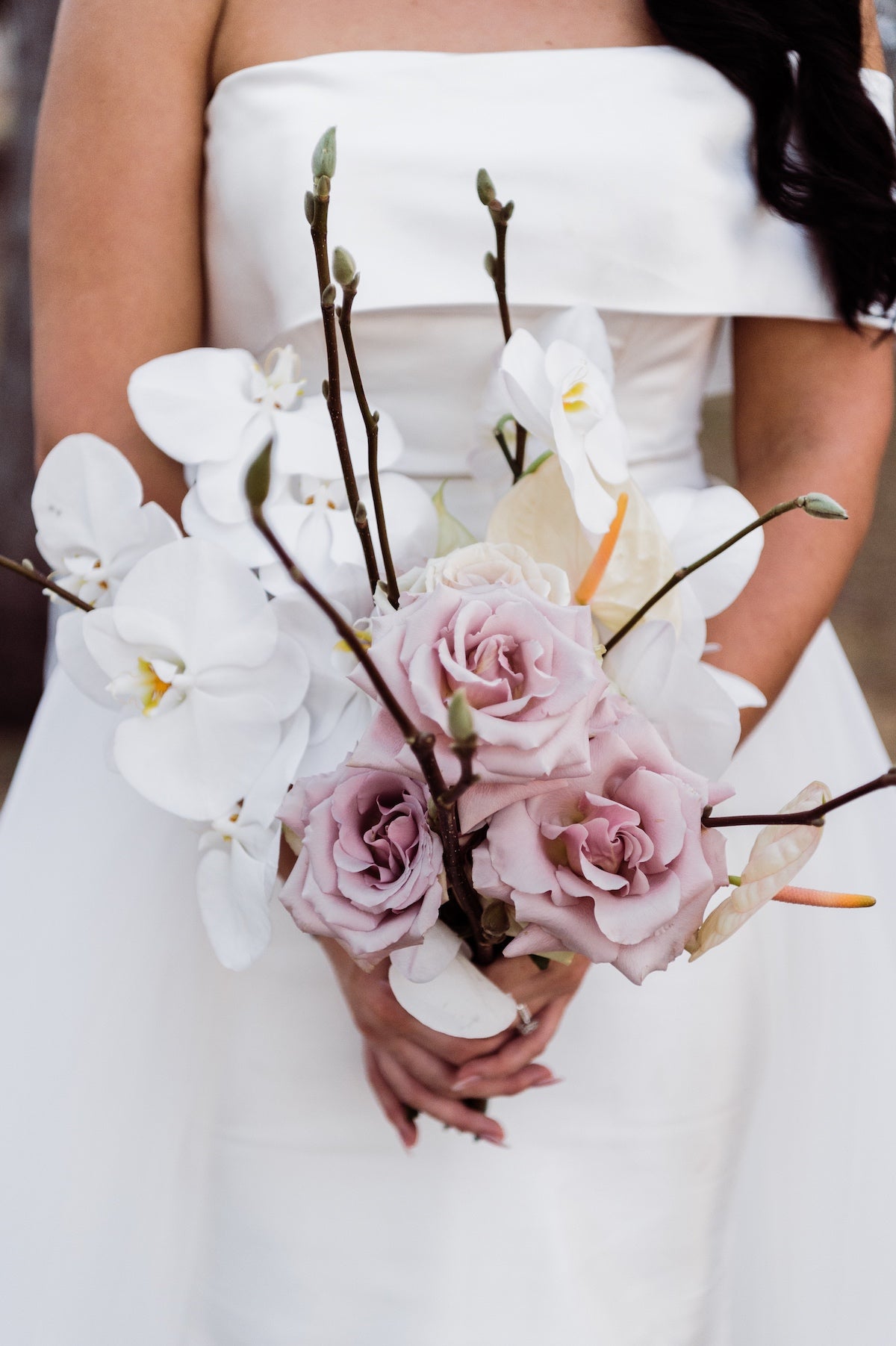 brides bouquet of orchids, anthuriums and phalenopsis orchids