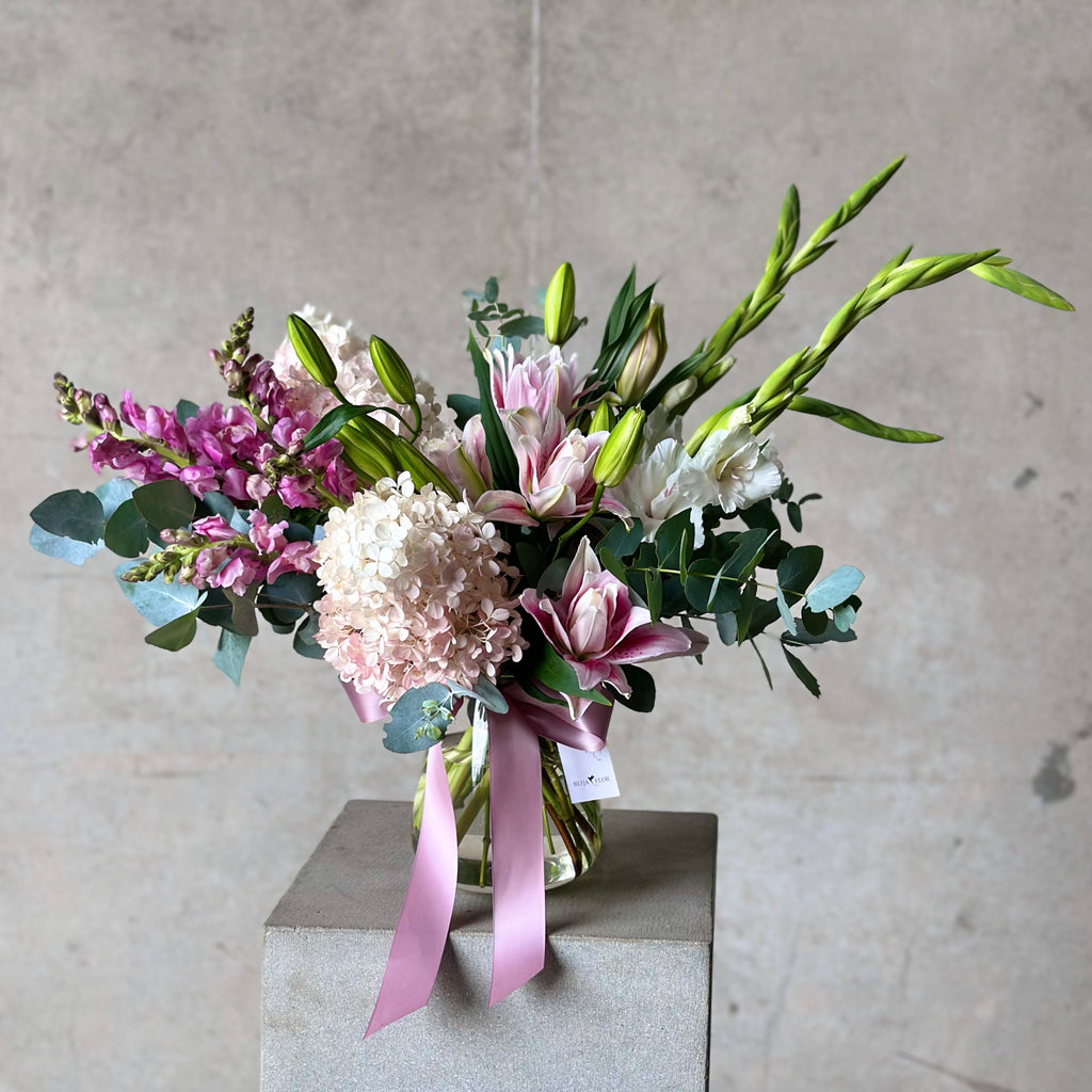 Beija Flor Vase arrangement including Hydrangea Paniculata, Gladioli, Rose Lillies, Snapdragons