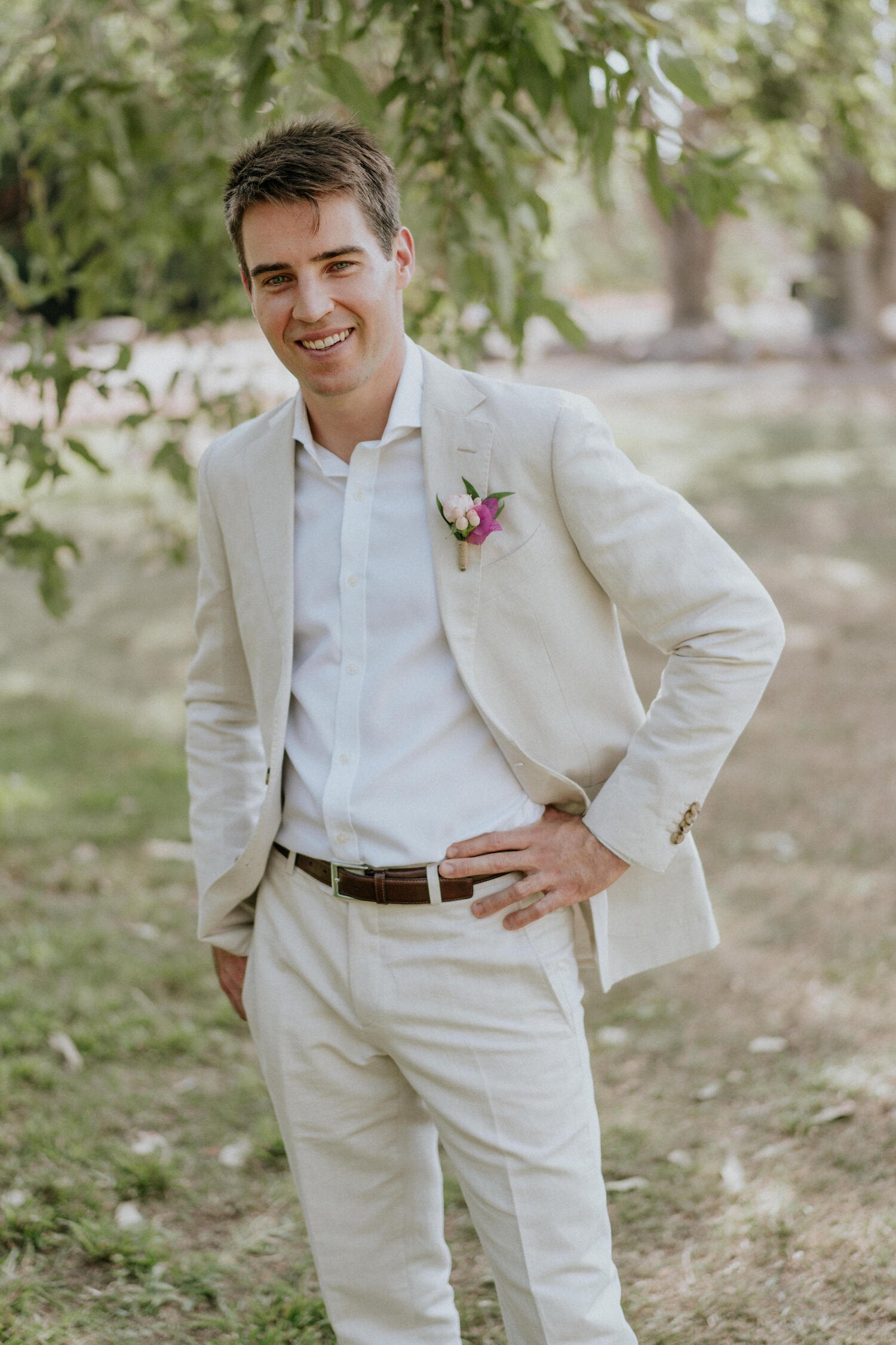 Groom wears Beija Flor buttonhole, photo by James Day