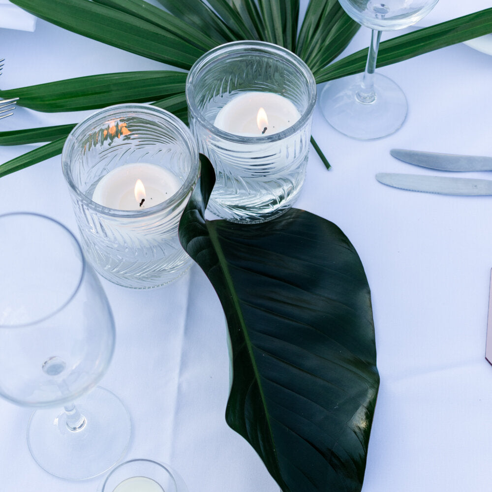 a close up of a table with two candles