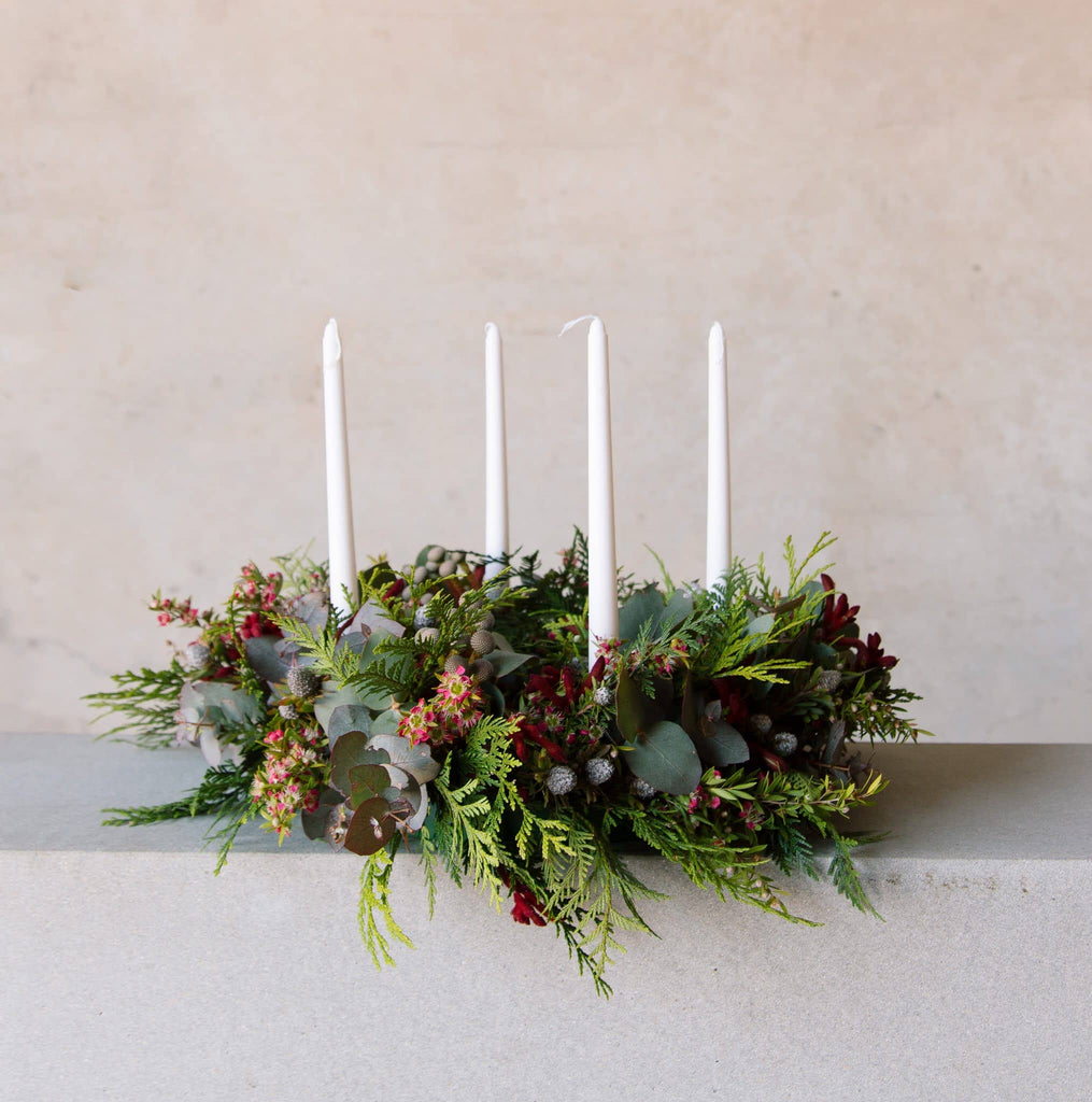 Beija Flor's Advent Wreath with stunning Christmas candle arrangement adorned with greenery and flowers