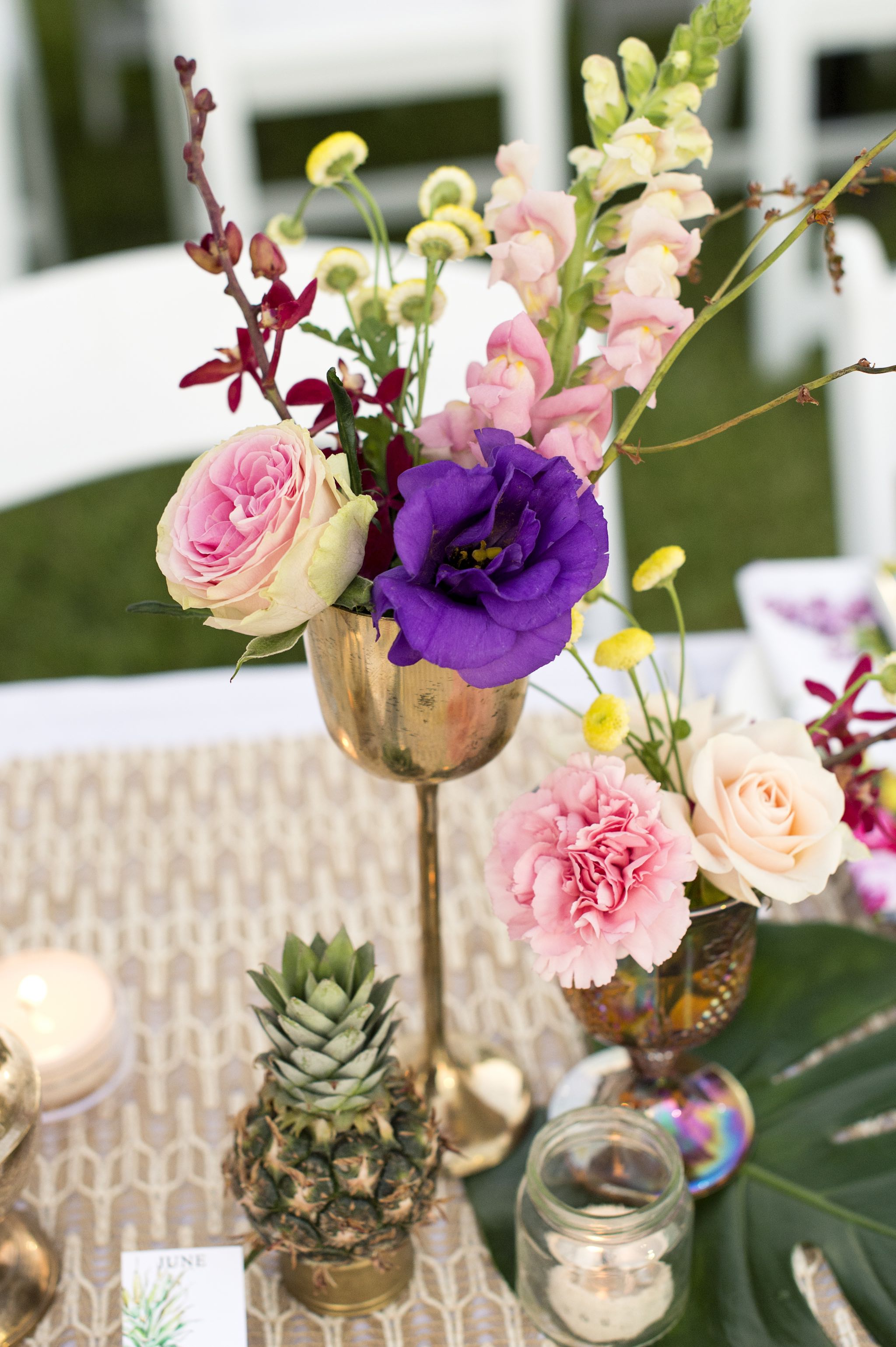 tropical flowers, pineapples and roses