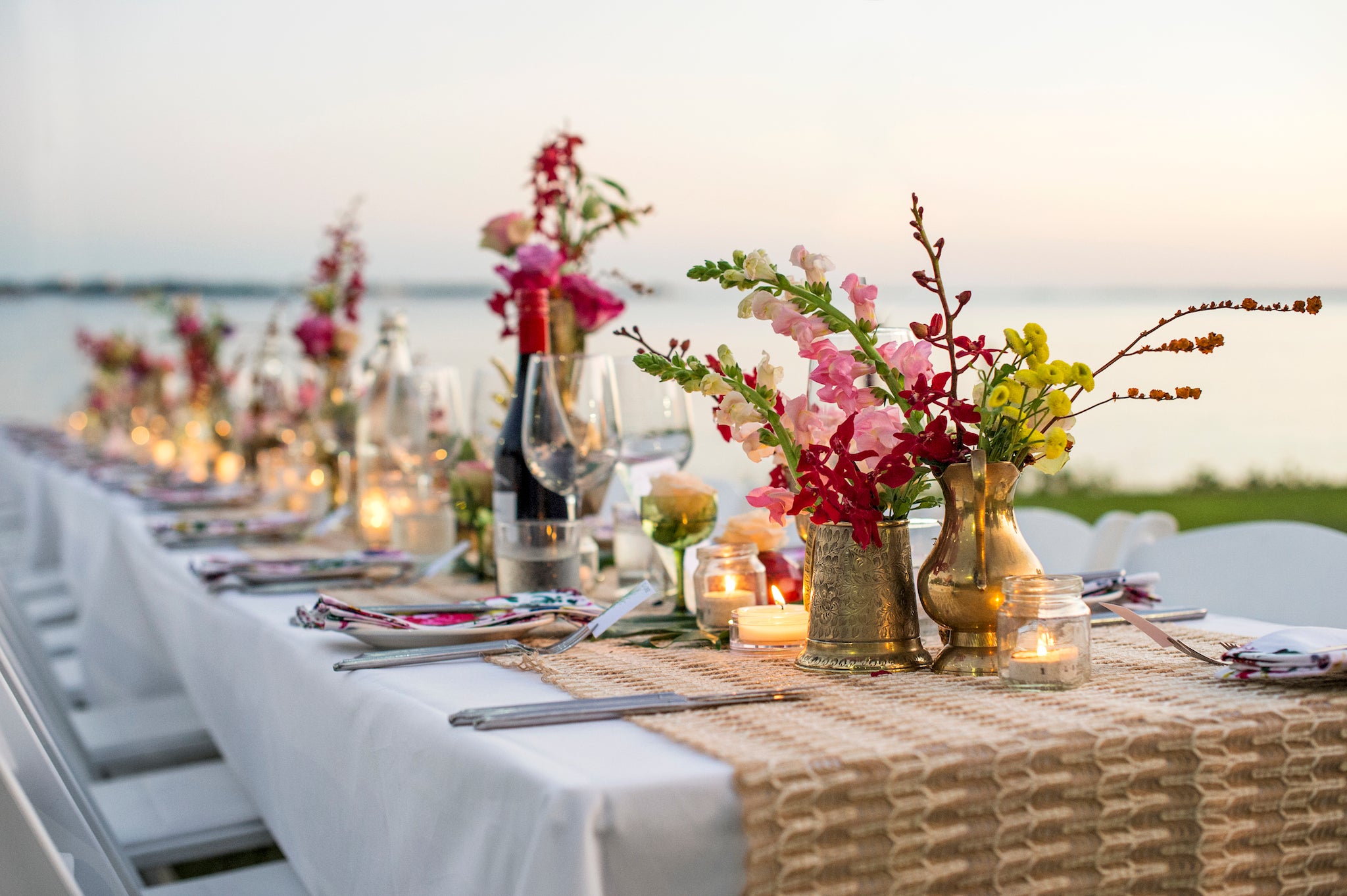 wedding guest tables filled with flowers