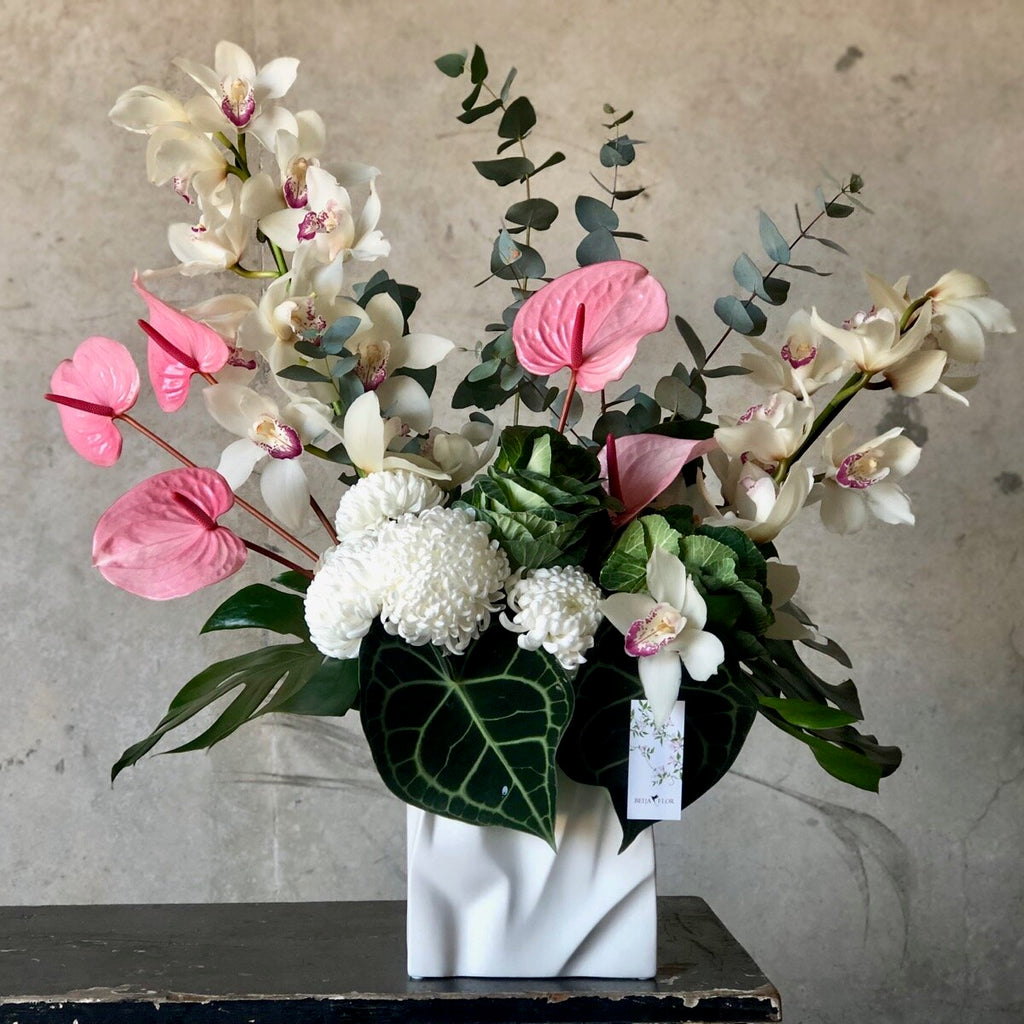 beija flor vase arrangement filled with white and pink flowers