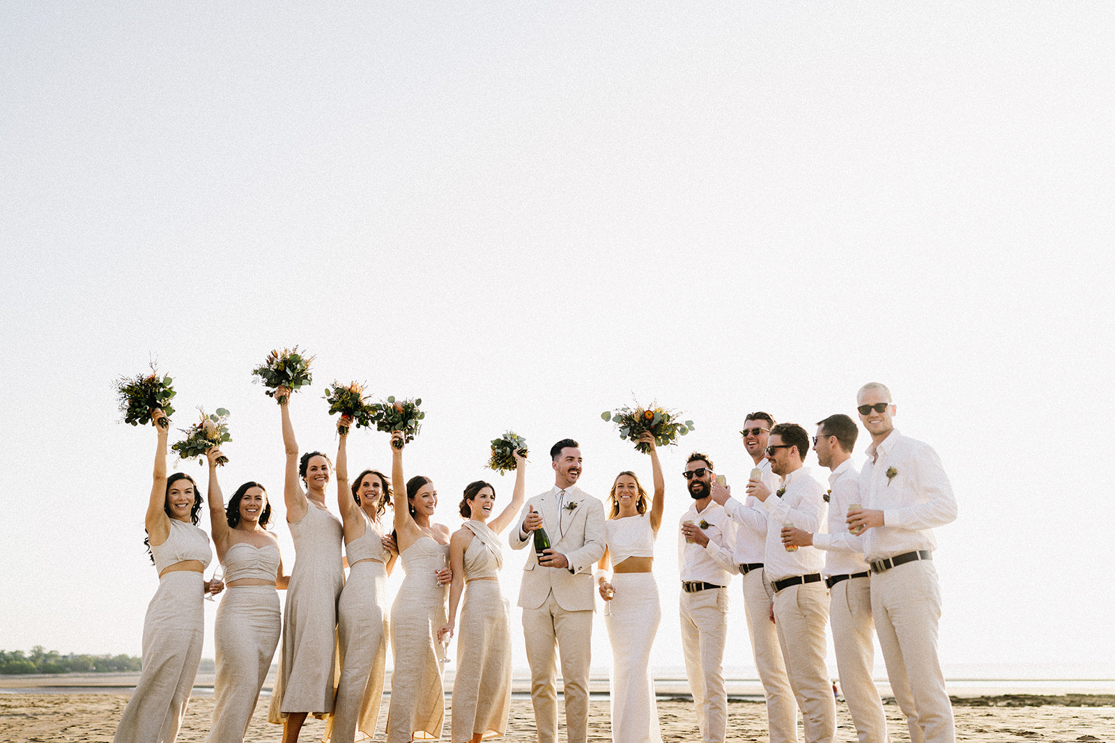 Hannah & Austin - Beija Flor Real Wedding - Bride Groom Bridesmaids and Goomsmen at the Beach