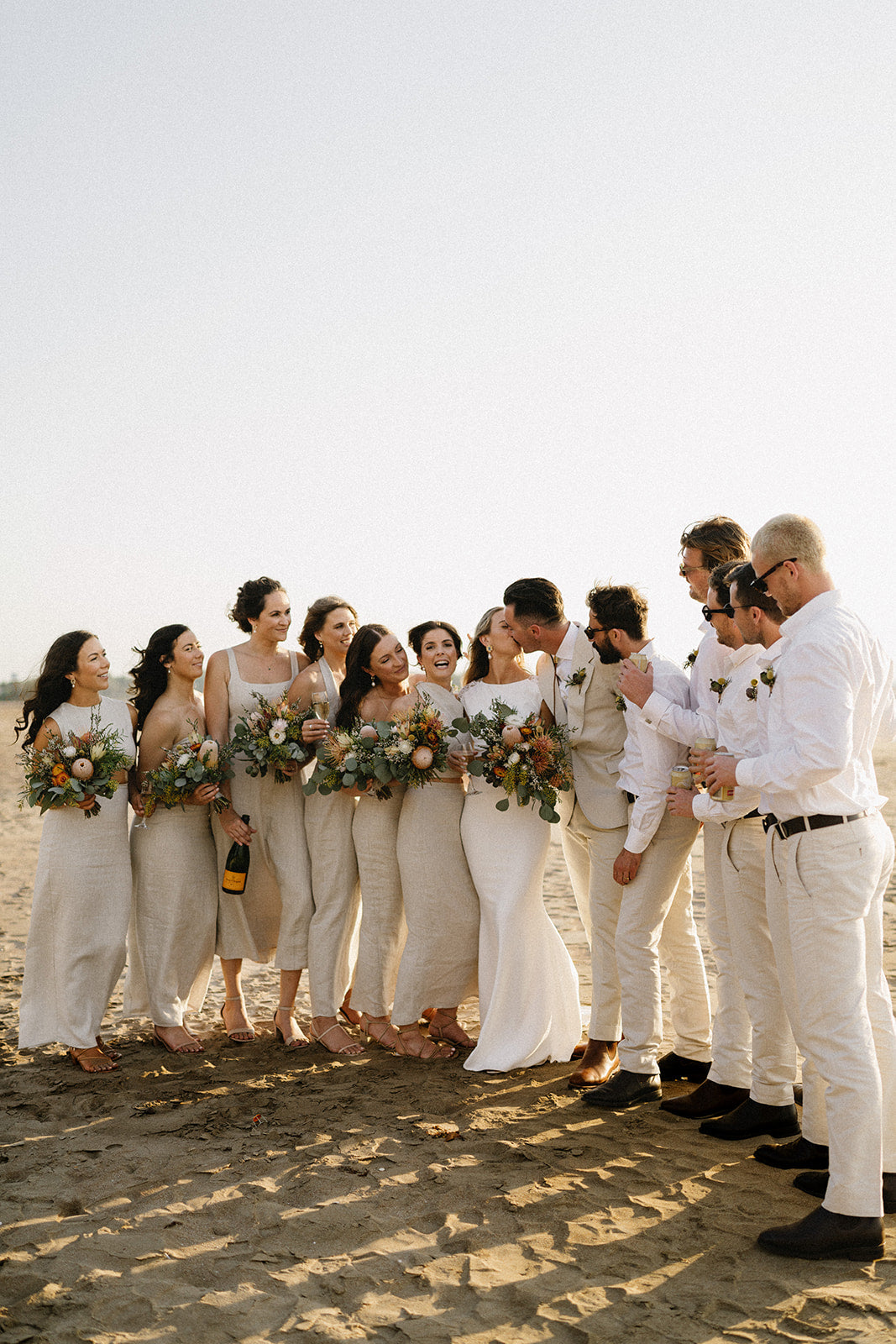 Hannah & Austin - Beija Flor Real Wedding - Brode and Groom Standing on top of a sandy beach