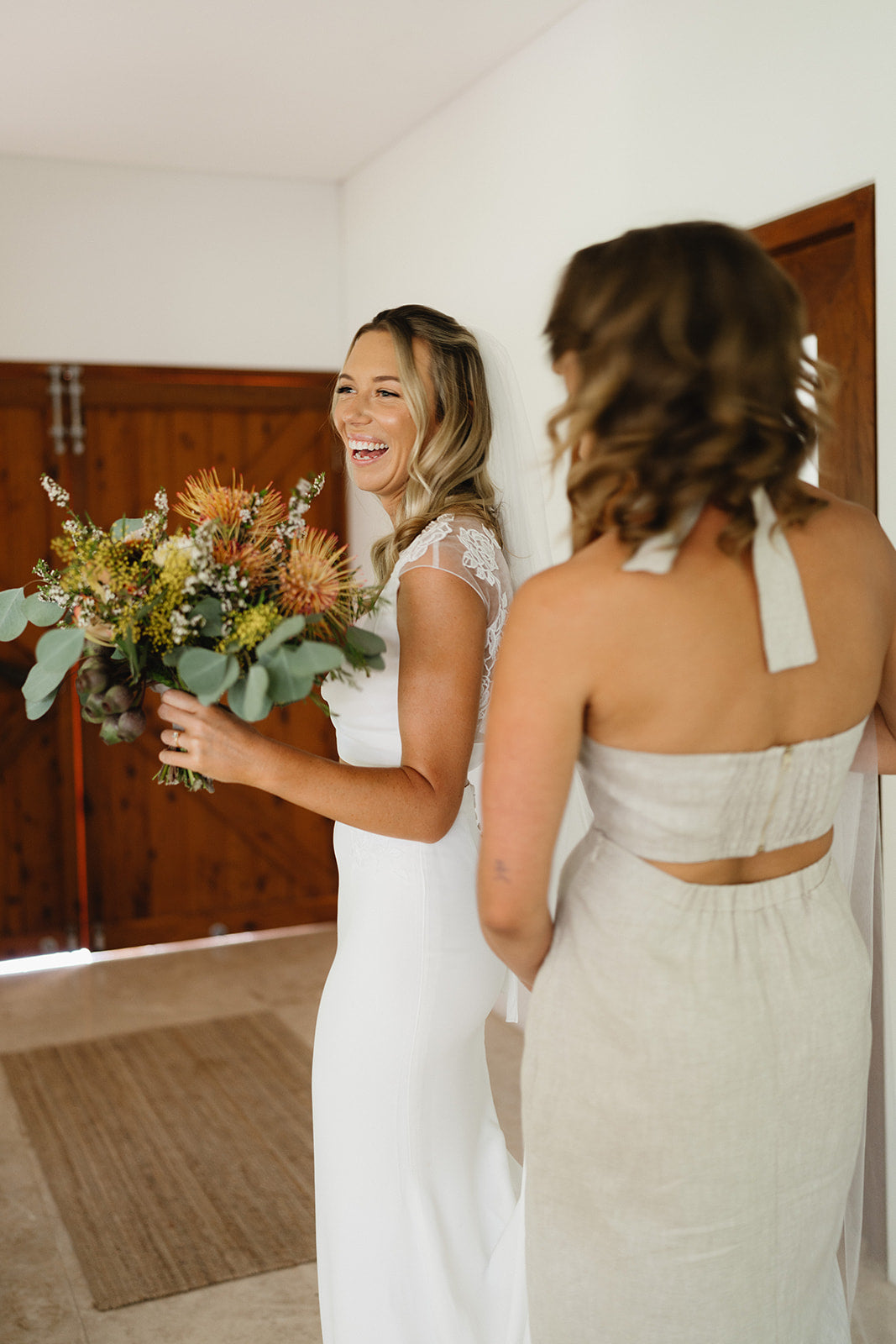 Hannah & Austin - Beija Flor Real Wedding - Smiling Bride Holding the Bouquet
