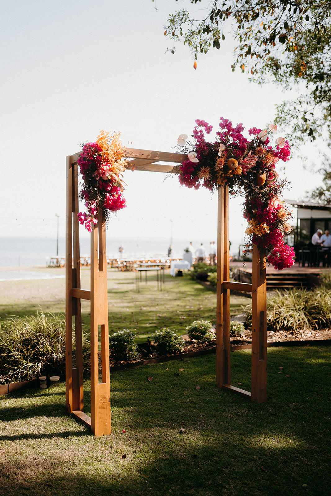 Naomi and Jack - Beija Flor Real Wedding - Wedding Arbour in Shades of reds, pinks, apricots