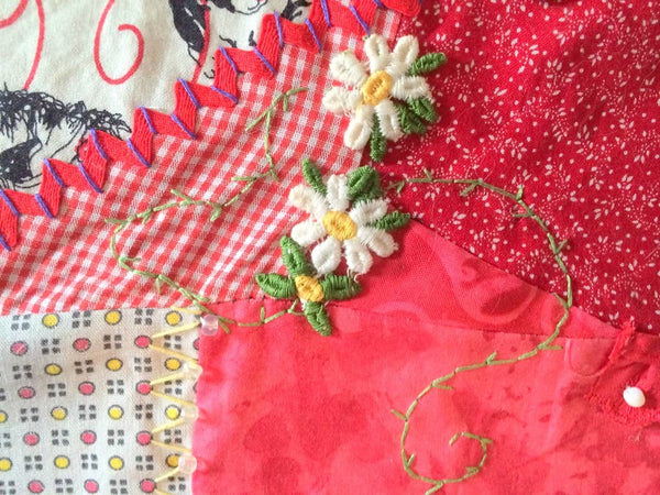 Sew on fabric flowers to your velvet curtains
