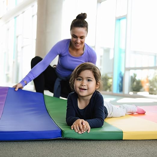 <strong>Versatile Design:</strong> Perfect for gymnastics, aerobics, yoga, and more, this tri-folding foam mat adds a vibrant flair to your fitness routine. Keep your workouts engaging or let your little ones unleash their energy with this multifunctional mat.