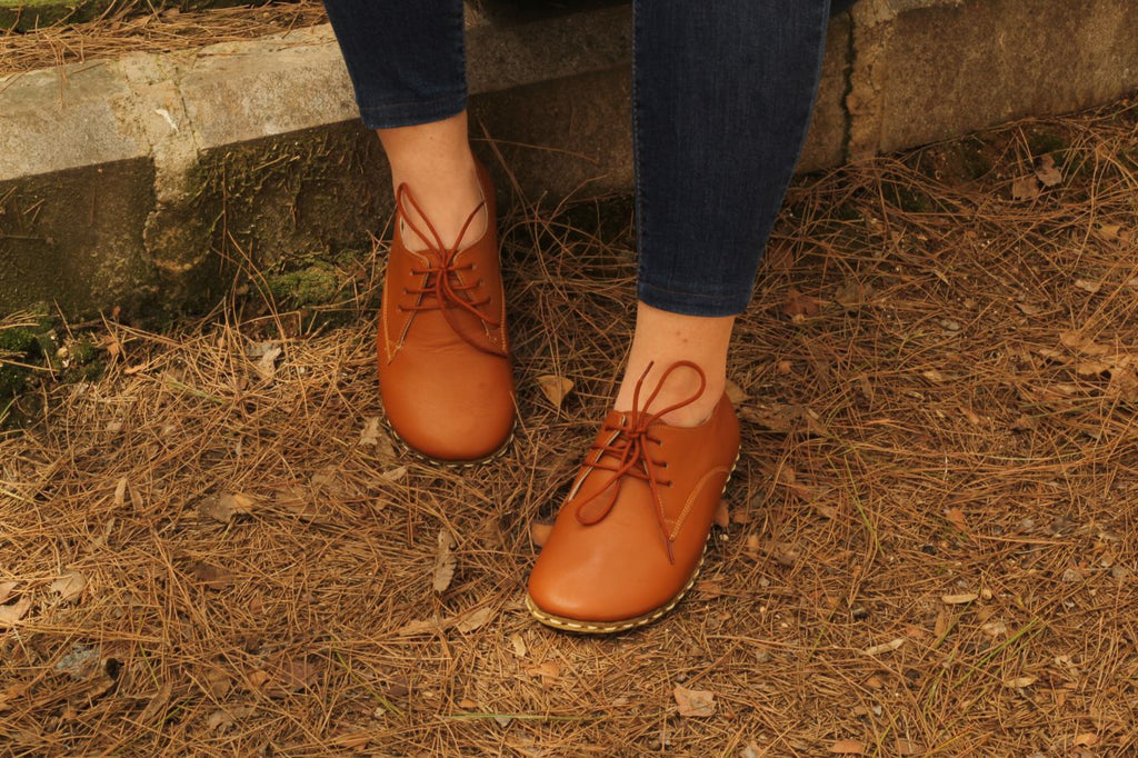 Leather sole in buffalo skin+copper rivets for instant ground feedback