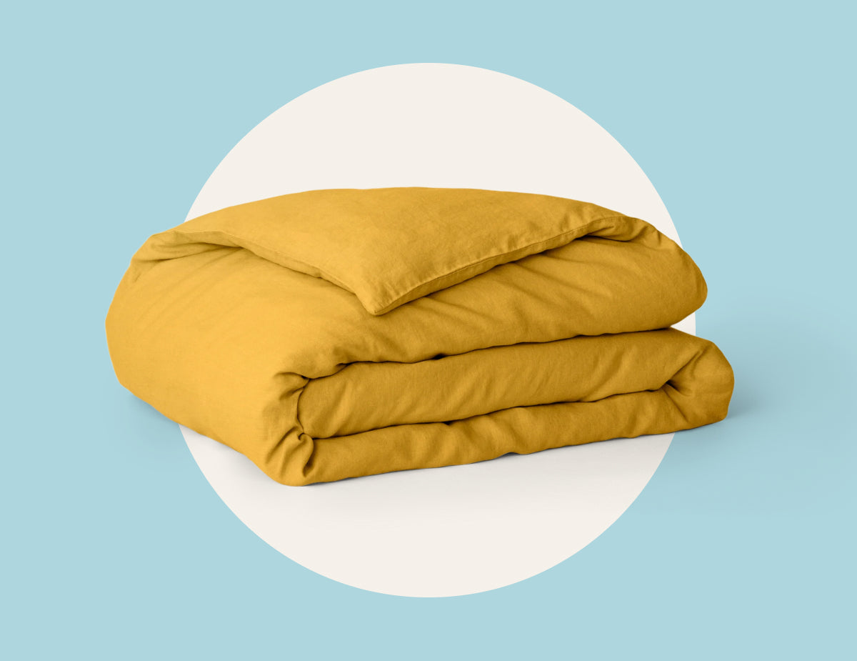 Picture of a duvet insert & cover by Tuft & Needle, a dorm room essential