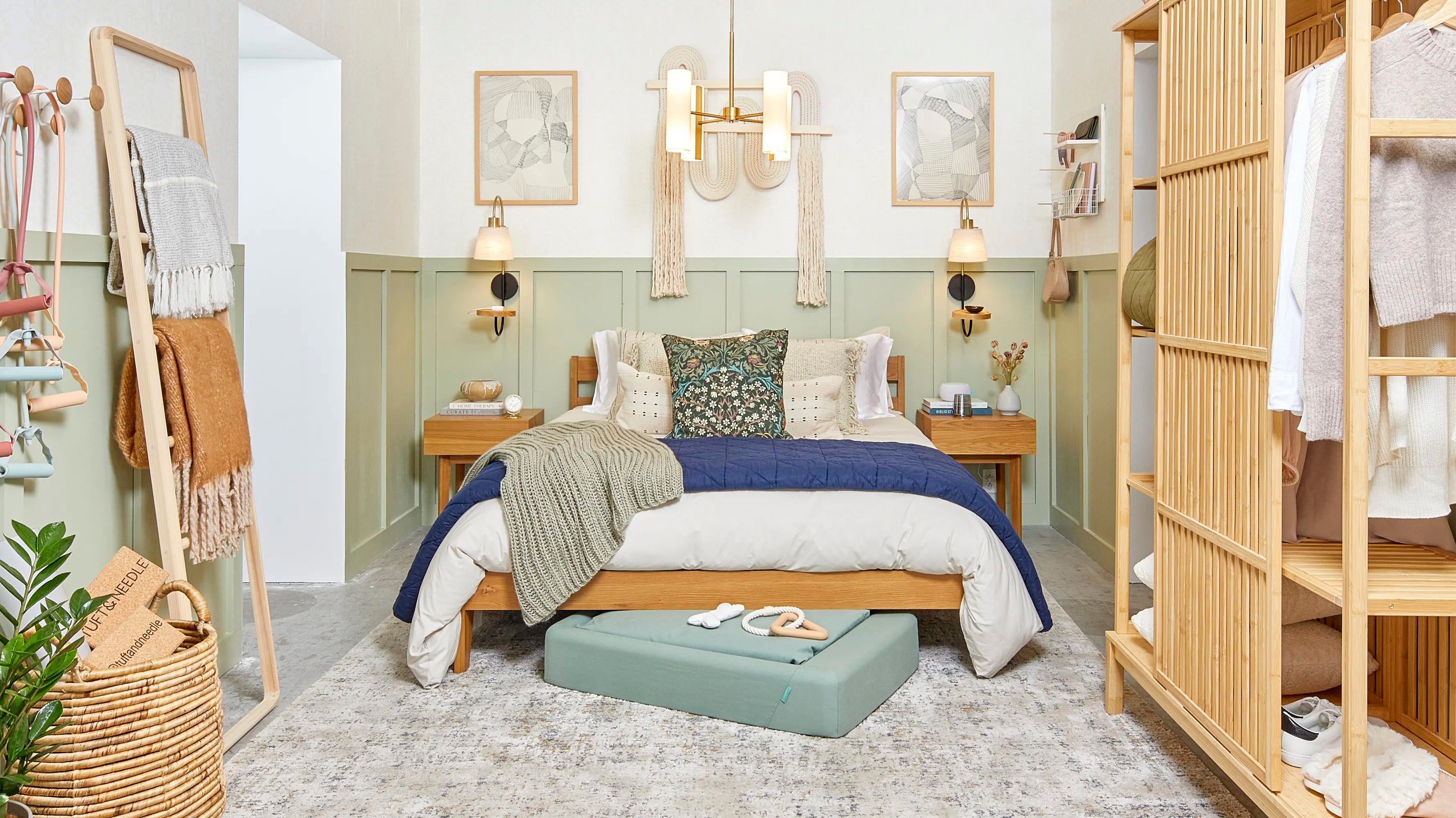 The Apartment Therapy bedroom designed by Anita Yokota using warm earthy tones - greens, tans, blues, and rust colors