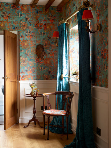 Desingner blue patterned wallpaper for walls, Luxury blue and orange patterned wallpaper, Luxury interiors 2022, Designer Interiors UK, Luxury Home inspo UK, Patterned wallpaper for walls UK, Blackpop Designer UK, Wirksworth Textiles UK