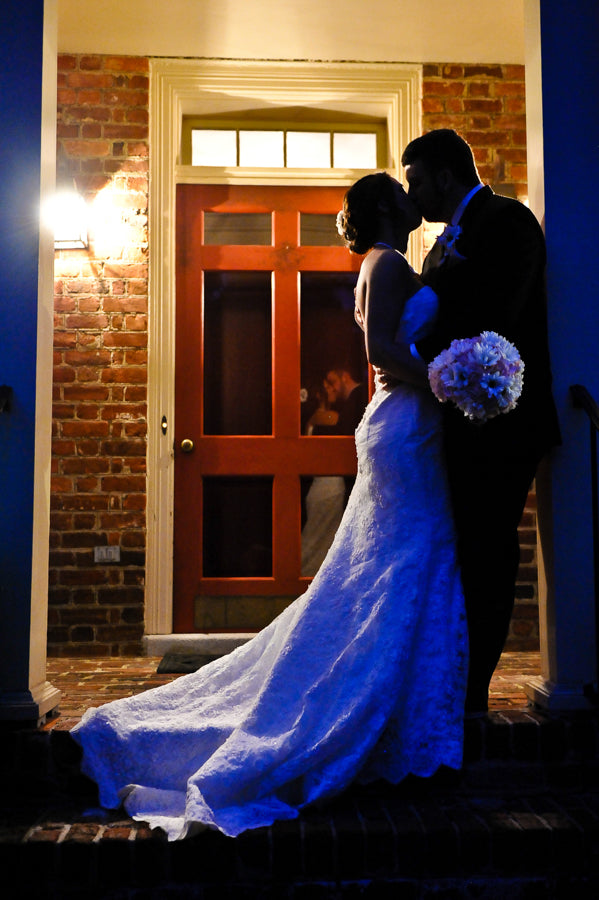 Bride and groom kissing