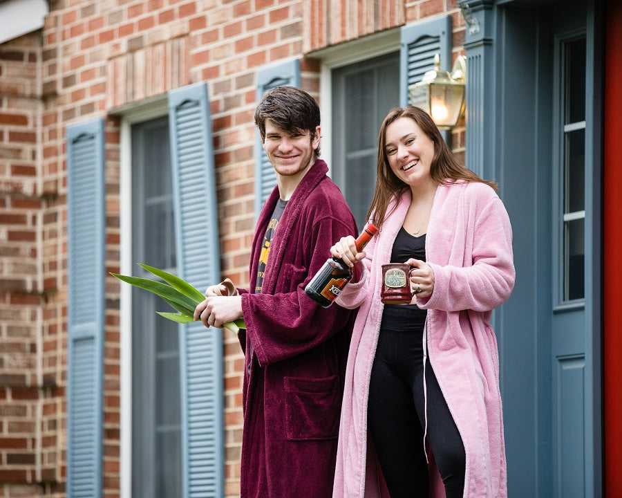 couple posing on front porch