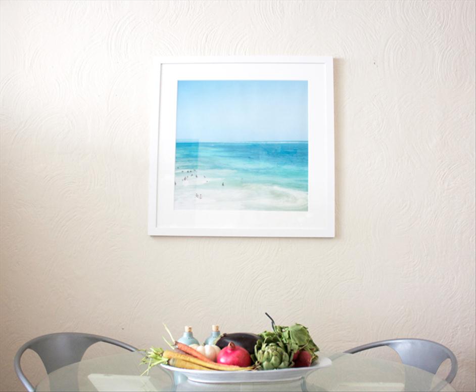 Tulum photograph hanging in kitchen