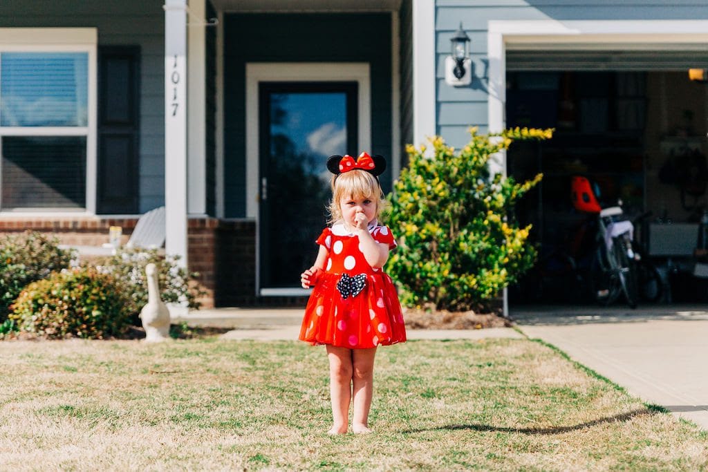 Young girl in minnie costume